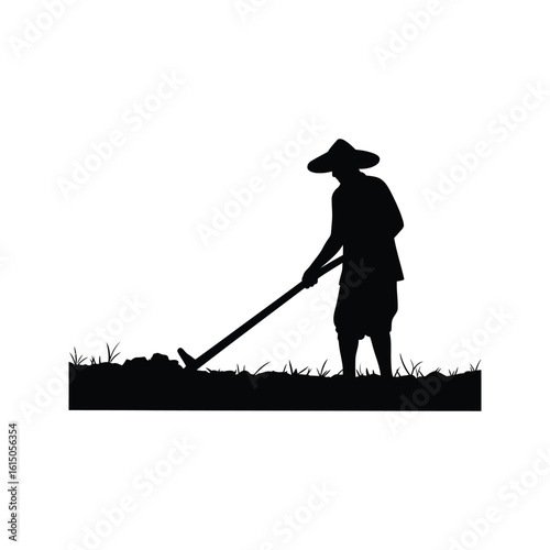 Silhouette of a farmer tilling the land with a traditional hoe agriculture farming rural life