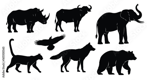 Vector silhouette illustration silhouettes of wildlife including an eagle, wolf, buffalo, and rhinoceros in natural habitats
