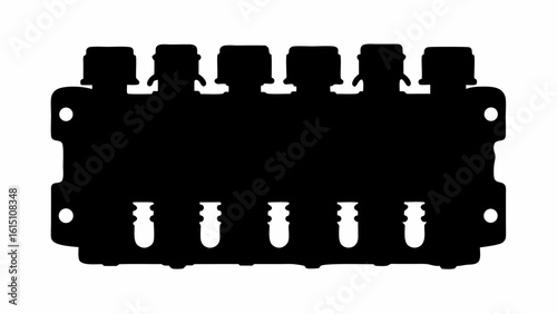 Silhouette of a manifold with multiple ports and mounting holes on a white background in a studio shot