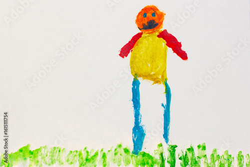 Colorful human figure. Real drawing of a small child. Drawing by pencil.