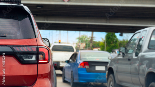 Εκτύπωση καμβά Rear view of red SUV tail lights in slow moving or stopped city traffic