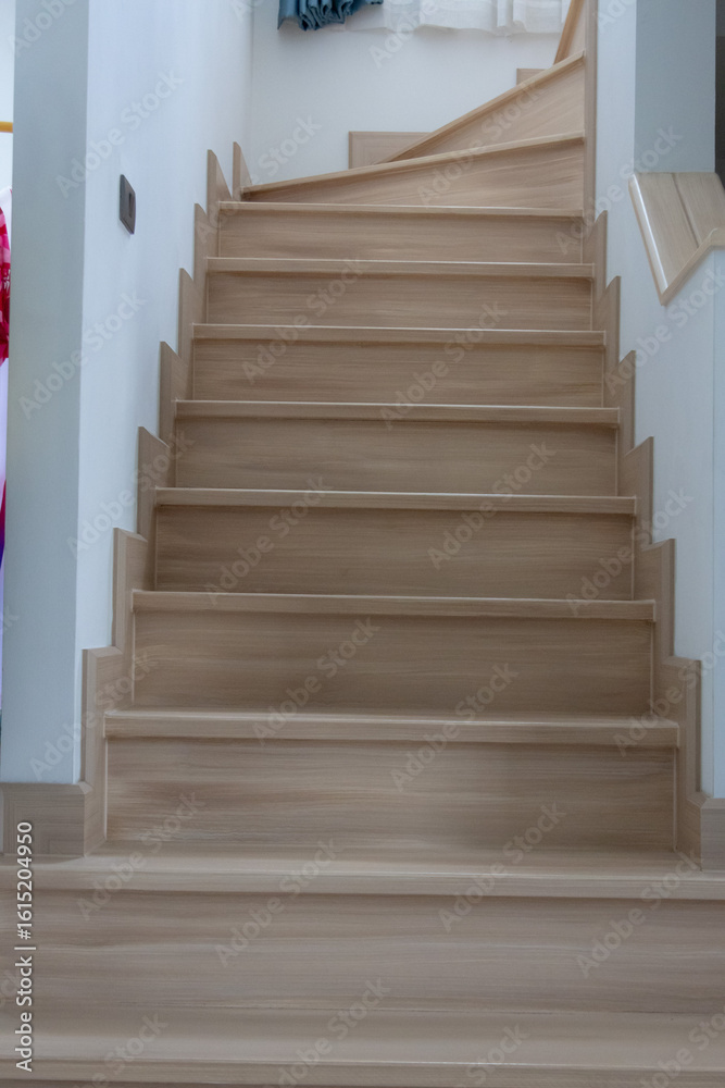 Fototapeta premium Wooden Staircase with Smooth Steps and Neutral Tones