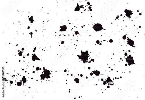 Black ink splatters create an abstract art piece with random patterns on a white background