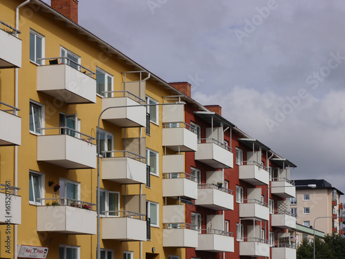 Wallpaper Mural Low angle view of buildings against cloudy sky Torontodigital.ca