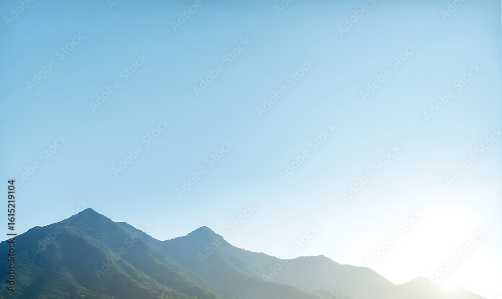 Obraz premium Mountains under a clear azure sky