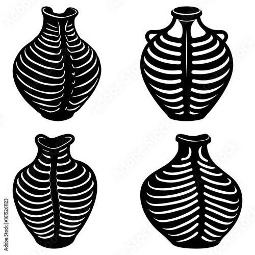Collection of four black and white vases with a ribbed design arranged in a square pattern on white