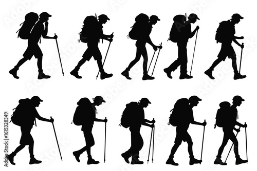 Silhouettes of hikers with backpacks and trekking poles in motion