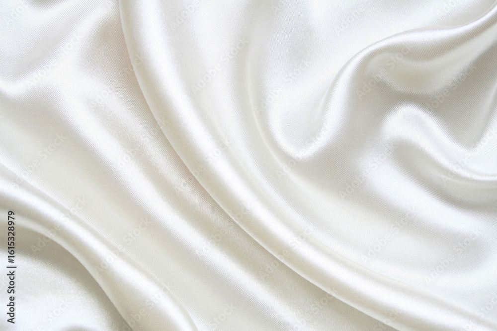 Obraz premium Elegant white satin fabric with soft folds and silky sheen. Ideal for bridal themes, luxury branding, fashion design, minimalist backgrounds, and premium visuals.