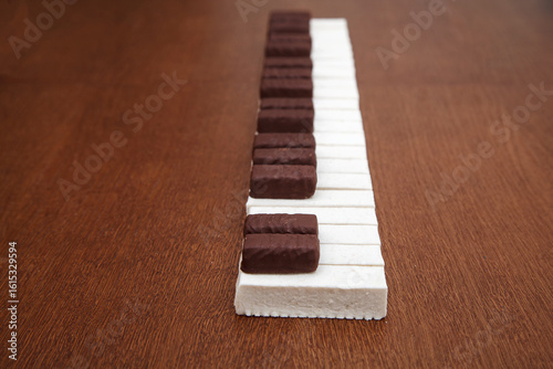 piano keyboard made of chocolates and marshmallows