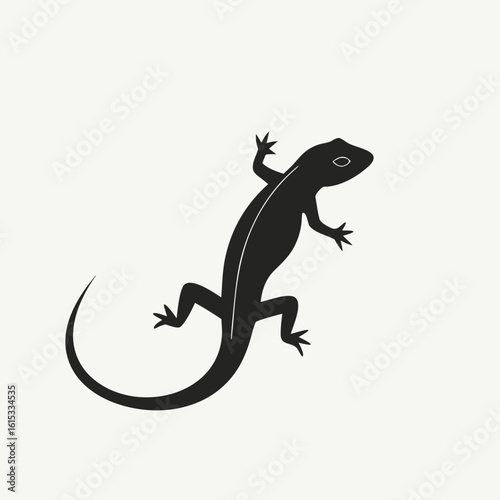 Small brown gecko, an isolated wild reptile with a long tail on a white background, close-up macro