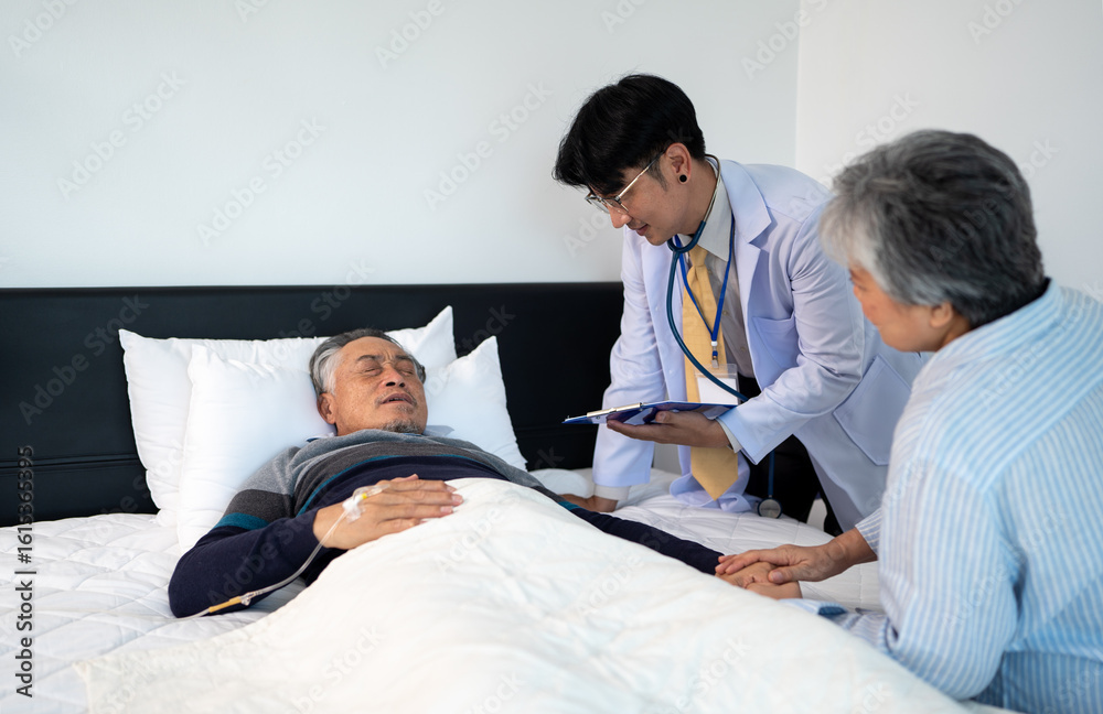 Fototapeta premium doctor explaining medical treatment for bedridden patient elderly hopeless senior man lying on bed. home caregiver nurse visit retirement patient for health check up recovery process medical service