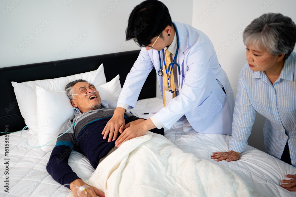 Obraz premium scene of doctor checking bedridden patient's stomach. illness senior man with infectious disease. home caregiver nurse visit retire couple for health check up recovery process medical service