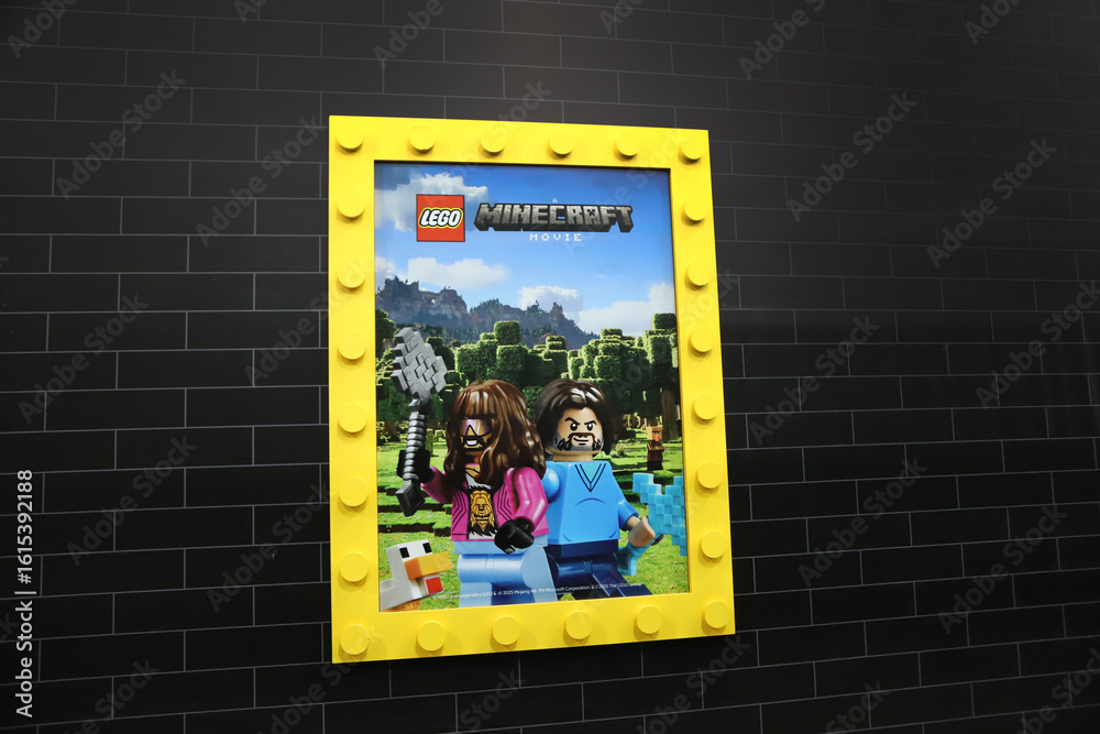 Fototapeta premium Lego Minecraft Movie poster with brick background and copy space