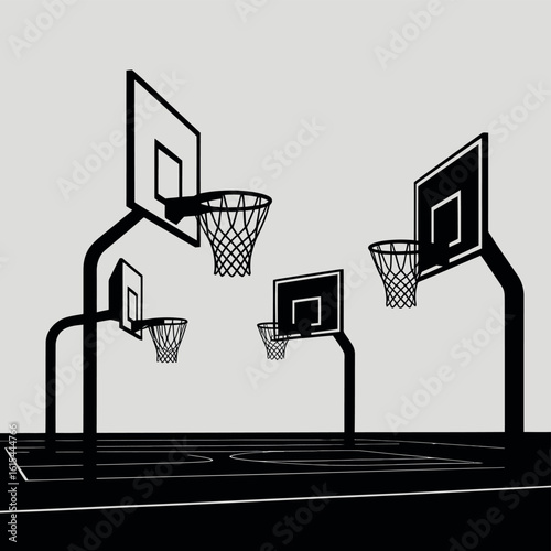 Multiple basketball hoops and backboards on a court
