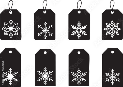 Elegant collection of black gift tags with white snowflake designs, perfect for Christmas and winter holiday presents.