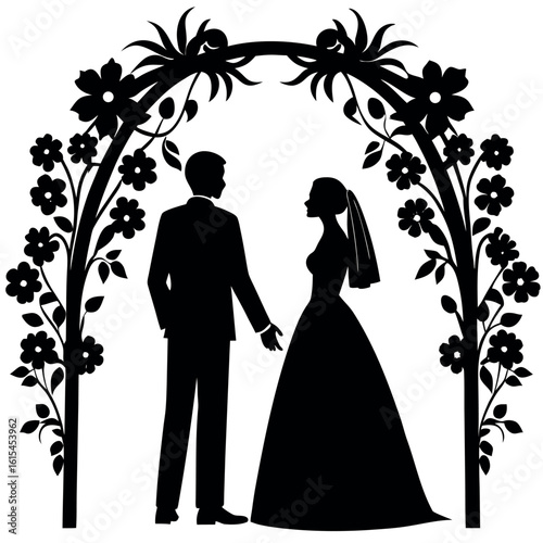 Silhouette of a bride and groom under a floral wedding arch
