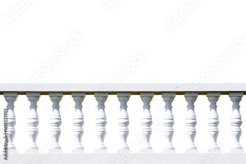 a white railing with a bird perched on it