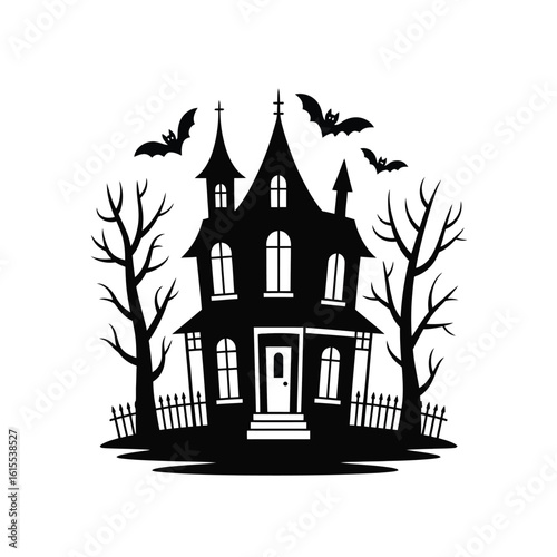 Spooky haunted house silhouette with bats and bare trees