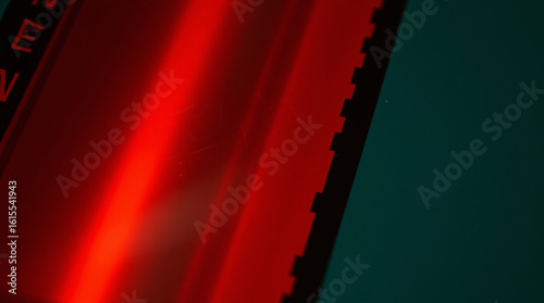 Abstract art with geometric shapes in red and green, creating a vibrant contrast.