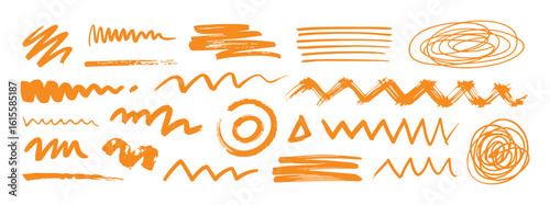 Orange brush strokes and scribbles abstract design elements doodle