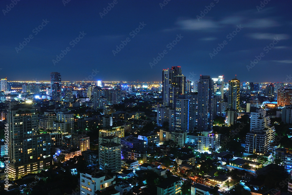 Obraz premium Bangkok skyline illuminating the night, a breathtaking view of thailand's capital city