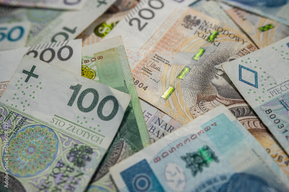 Obraz premium Close-Up View of Polish Zloty Paper Currency – Finance and Investment Concept Background