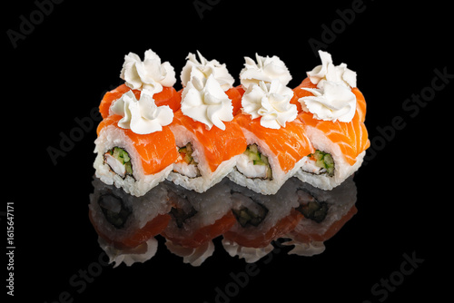 Quadro em tela Fresh sushi rolls topped with salmon slices and delicate cream rosettes are beau