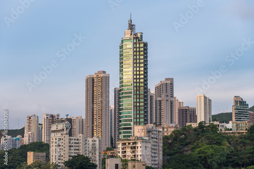Fotografie View to the skyscarpers of Hong Kong from Blue Pool Road