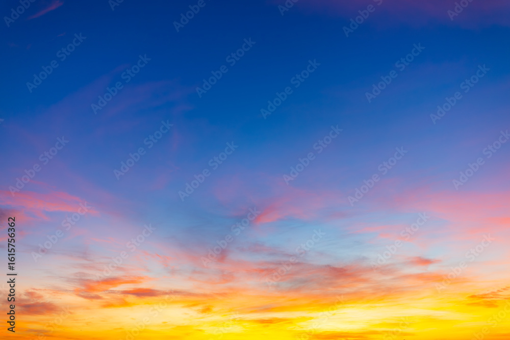 Obraz premium Colorful morning sky and clouds backdrop,Beautiful Vivid sky painted by the sun leaving bright golden shades