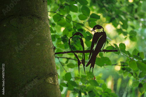Pair of metal swallows at Bolam Lake, which is a country park in Northumberland, England known for its scenic lake and woodland walks
