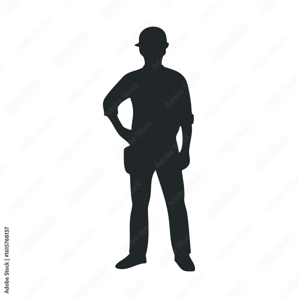 Silhouette of male construction worker in hard hat standing confidently Silhouette of male construction worker in hard hat standing confidently