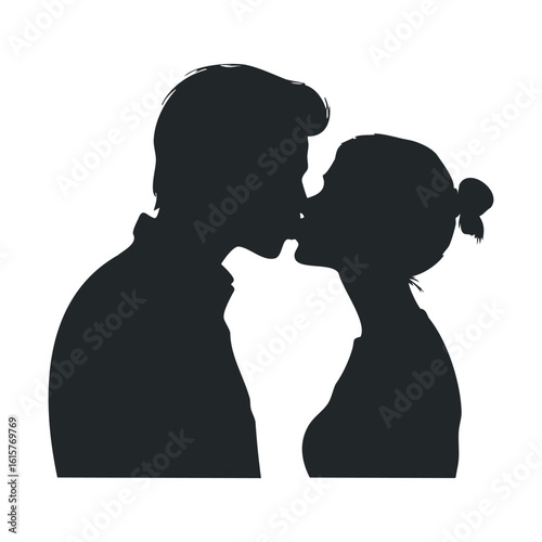 Silhouette of young caucasian male and female kissing