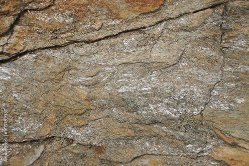 Texture and background of schist rock surface in the nature.