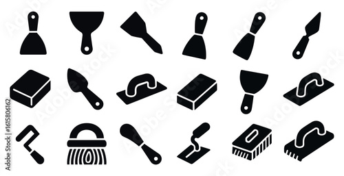 Collection of various tools for home improvement. The tools include a putty knife, a trowel, a paint scraper, and a paintbrush