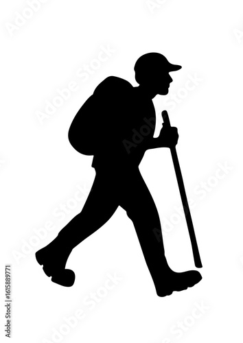 Silhouette of a Hiker with Backpack and Walking Stick