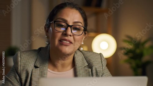 Confident Woman Talking on Video Call with Professional Appearance