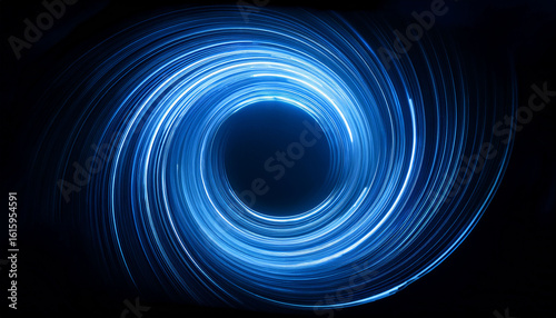 blue light trails rotating forming a circle on dark background