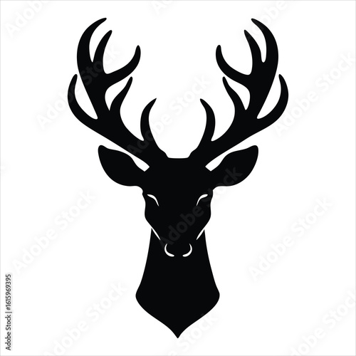 Majestic deer head silhouette with antlers isolated on white background