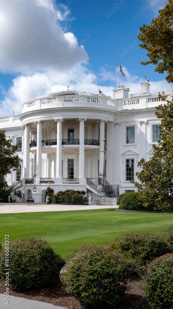 Obraz premium White House in Washington DC displays vibrant autumn colors and greenery in a wide-angle view with ample space for additional text
