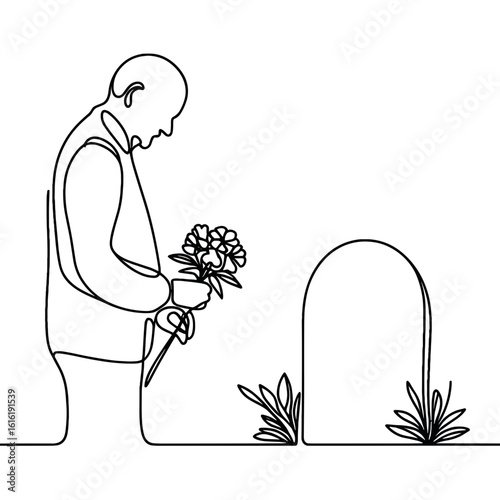 Man placing flowers at grave
