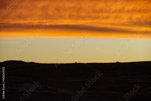 sunset over the hill