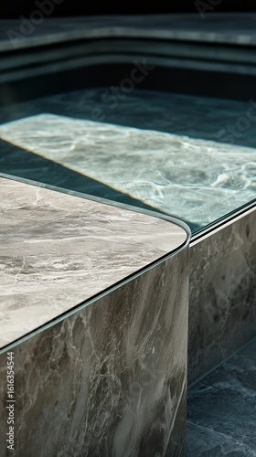Modern Marble Edges and Tranquil Water Create Serene Atmosphere in Luxury Spa...