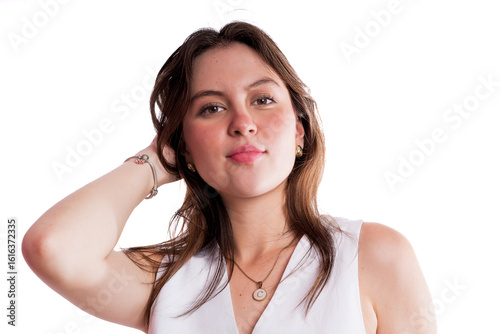 Photos Studio Portrait of Young Woman with Natural Look and Sleeveless Blouse