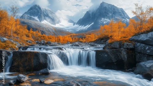 Waterfall Cascading Down Rocks With Autumn Trees and Mountains in Norway Duri...