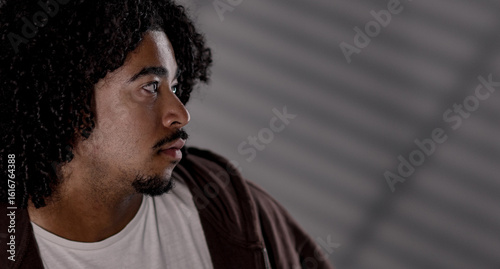 Cuadro en lienzo Close up profile portrait of a serious young african-american man with curly hai