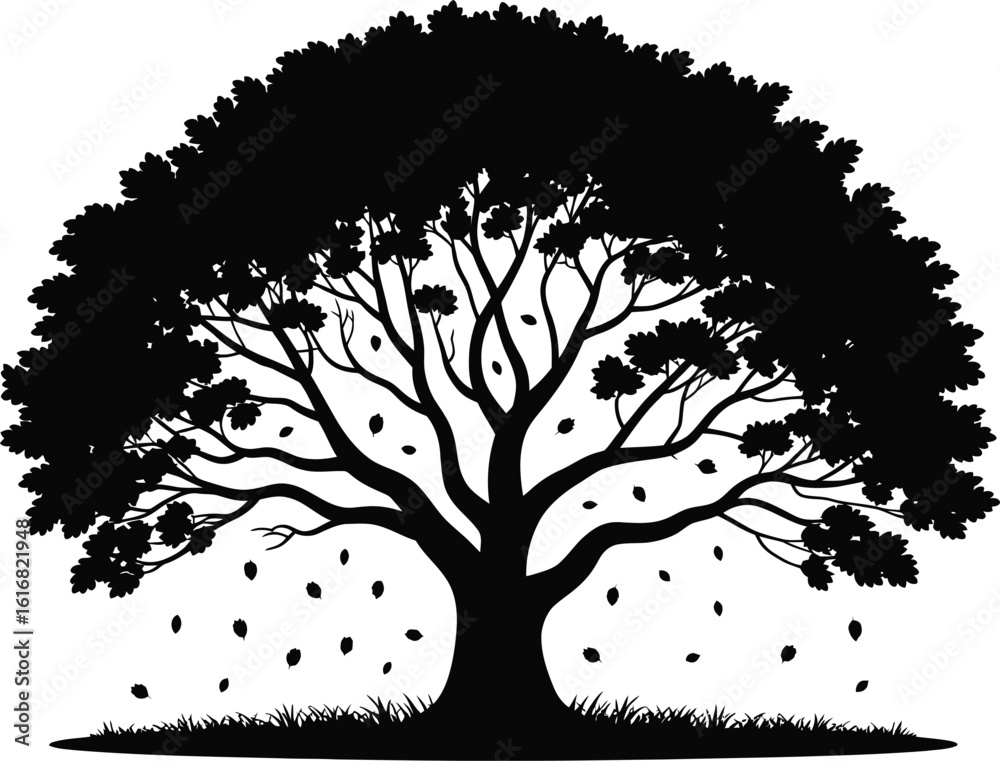 Fototapeta premium Majestic tree with falling leaves in black and white silhouette