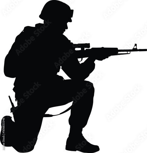 Soldier aiming a rifle on one knee silhouette
