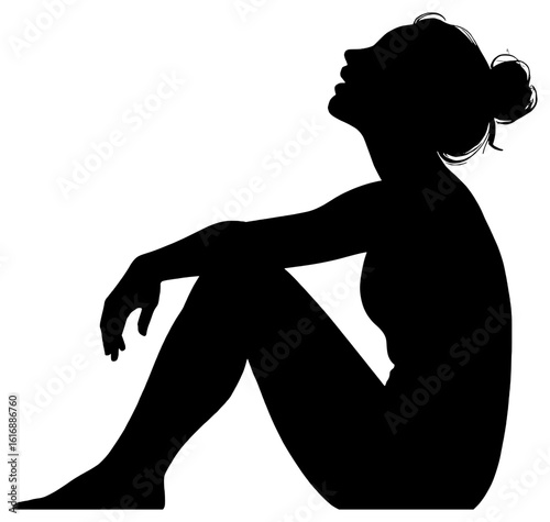 Silhouette of a Woman Sitting in Contemplation