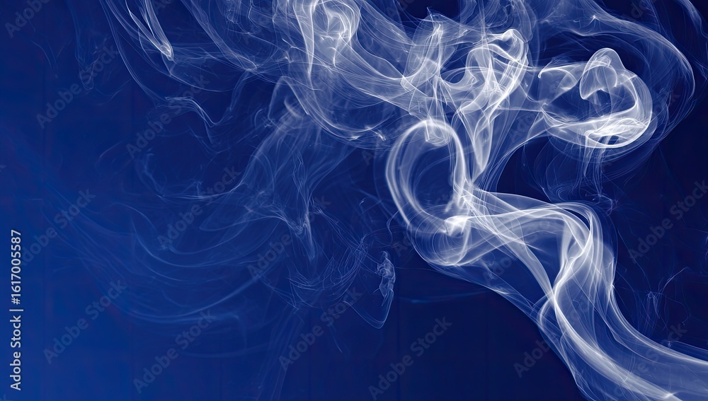 Fototapeta premium Abstract smoke patterns on a deep blue background