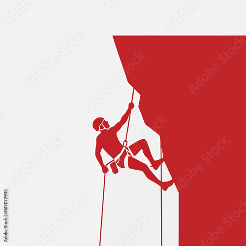 Silhouette of a rock climber rappelling down a cliff face.